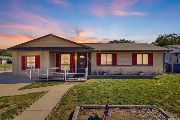 Single-story home at sunset